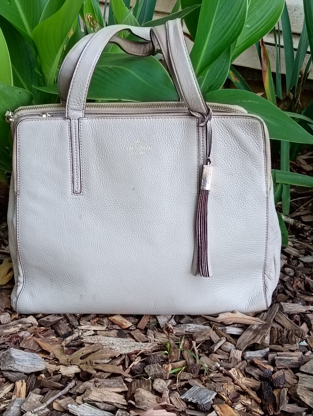 kate spade Cream Pebble Leather Tote with Tassel With Storybook Lining